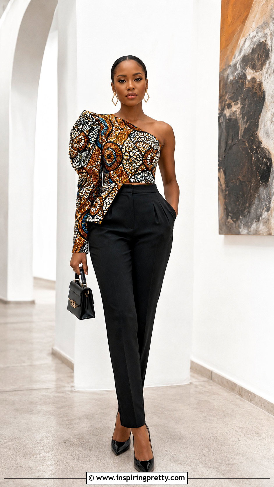 Ankara Asymmetric Top With Black Trousers - 50 latest ankara top styles