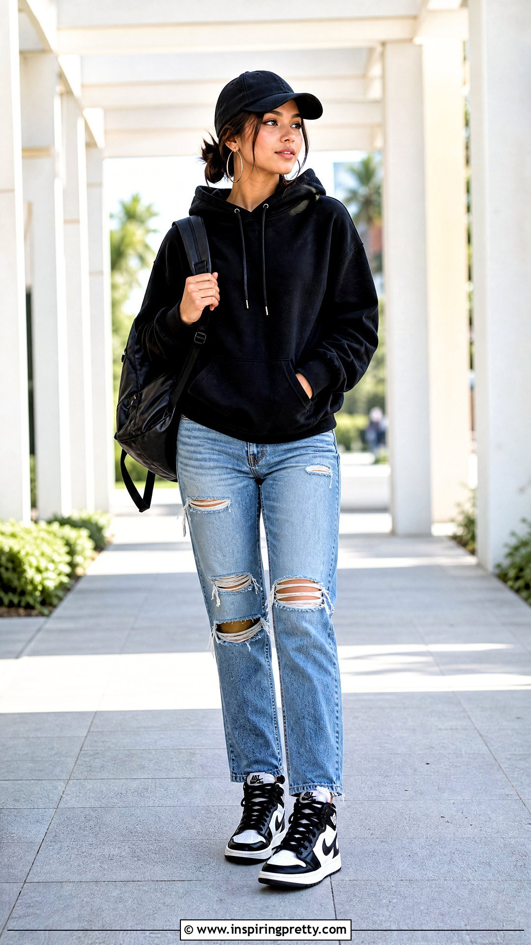 Black Hoodie With Ripped Blue Jeans - 50 blue jeans black top outfit ideas